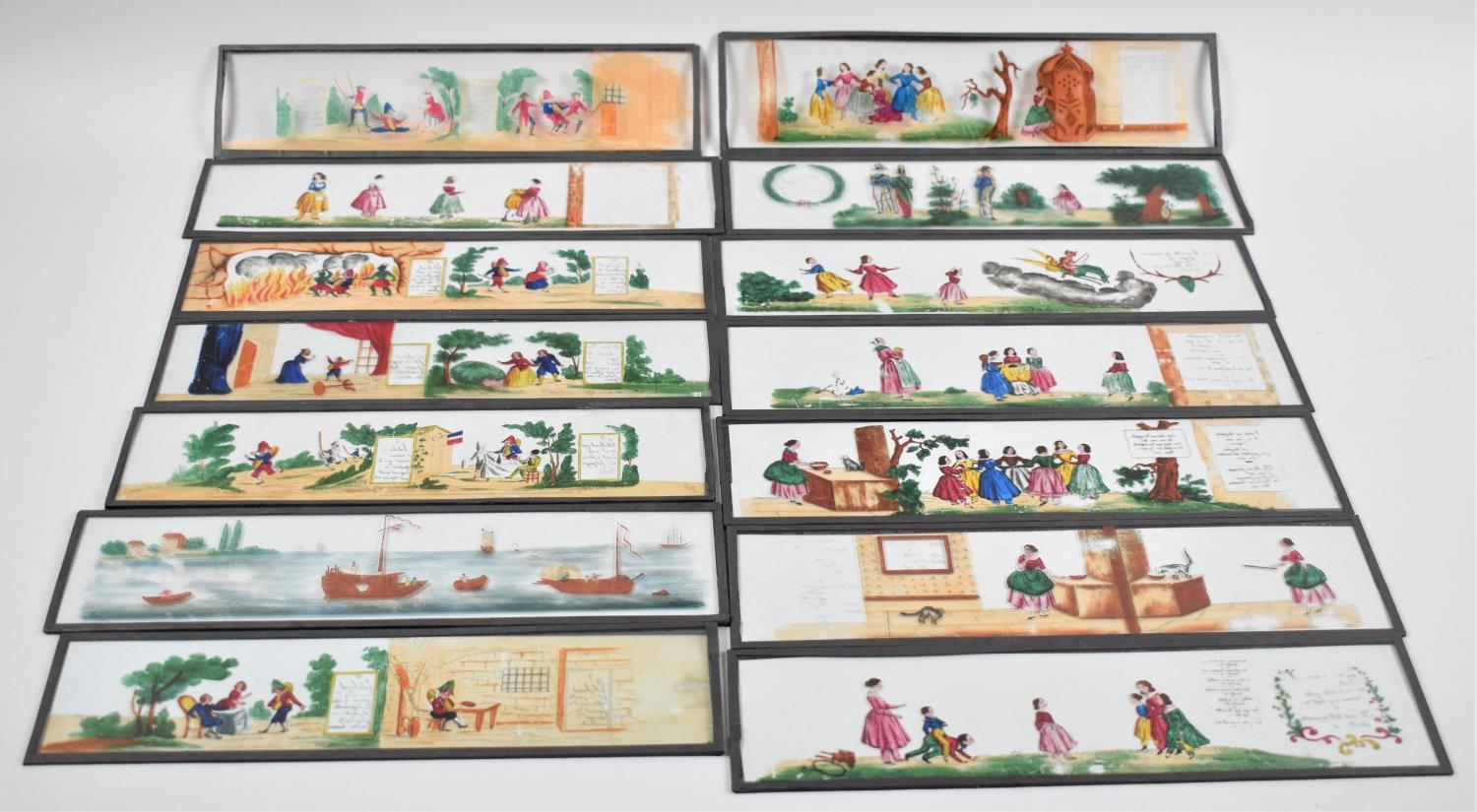A Collection of Fourteen Hand Coloured French Magic Lantern Slides, Each 29.5cms Long