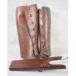 Two Pairs of Vintage Leather Chaps Together with a Folding Mahogany Boot Pull