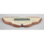 A Reproduction Wall Hanging Enamelled Aluminium Aston Martin Plaque, 35cm wide
