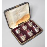 A Cased Set of Six Tot Glasses in Silver Holders, Each 5cm high, One Glass Missing, Birmingham