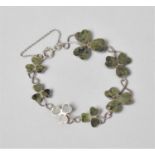 A Silver Bracelet Made up of Graduated Shamrock