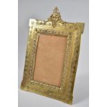 A French Bronze Easel Back Photo Frame with Horned Devil Finial, Stamped Back, 26cm High and 17cm