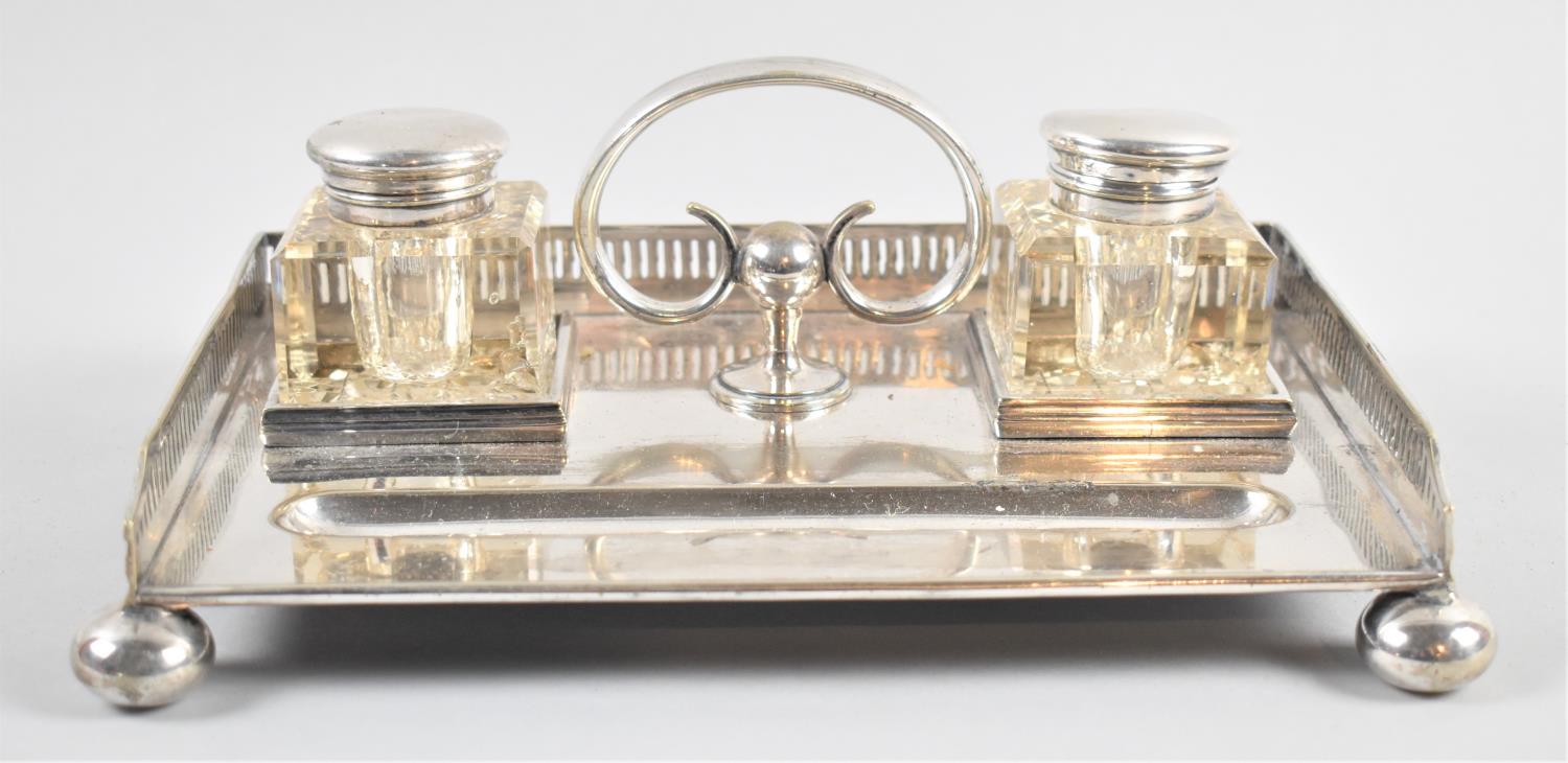 A Late Victorian/Edwardian Silver Plated Desk Top Ink Stand with Two Glass Bottles, Pen well and