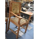 An Oak Framed Tapestry Seated and Back Vintage Armchair