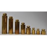 A Graduated Set of Eight Brass Cylindrical Weights, The Bases Stamped GWR and the Tallest 17cms High