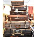 A Collection of Six Vintage Suitcases