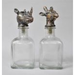 A Pair of Glass Decanters with Novelty Stoppers, Rhino and Giraffe