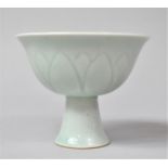 A Chinese Duck Egg Celadon Glazed Porcelain Stem Cup with Incised Leaf Decoration, 9.5cm high