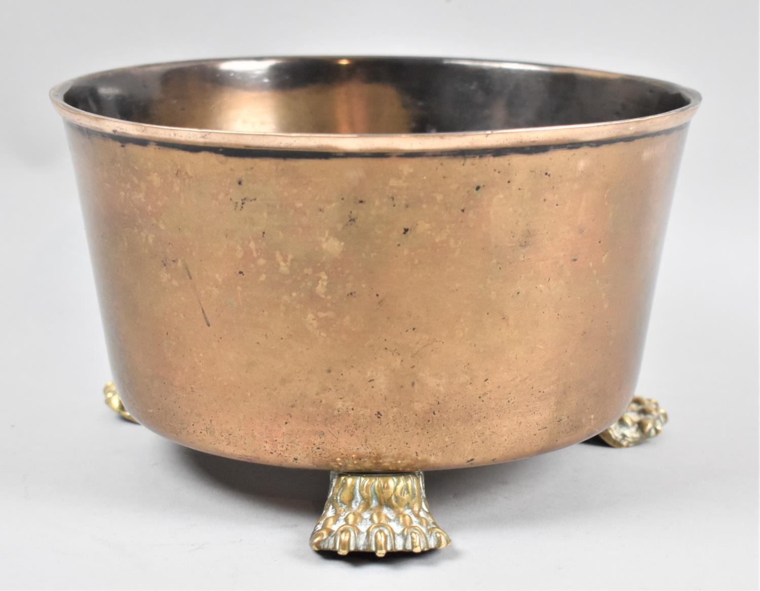 A Brass Circular Planter on Three Claw Feet, 21cm diameter