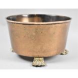 A Brass Circular Planter on Three Claw Feet, 21cm diameter