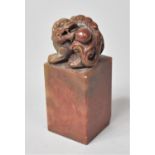 A Chinese Carved Soapstone Seal with Temple Lion Finial, Rectangular Support, 10cm high