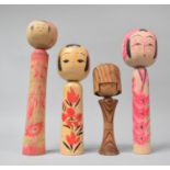 A Collection of Four Japanese Kokeshi Dolls, 25cm Long