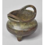 A Small Bronze Chinese Censer of Bulbous Bellied Form Raised on Tri Supports, Four Character Mark to