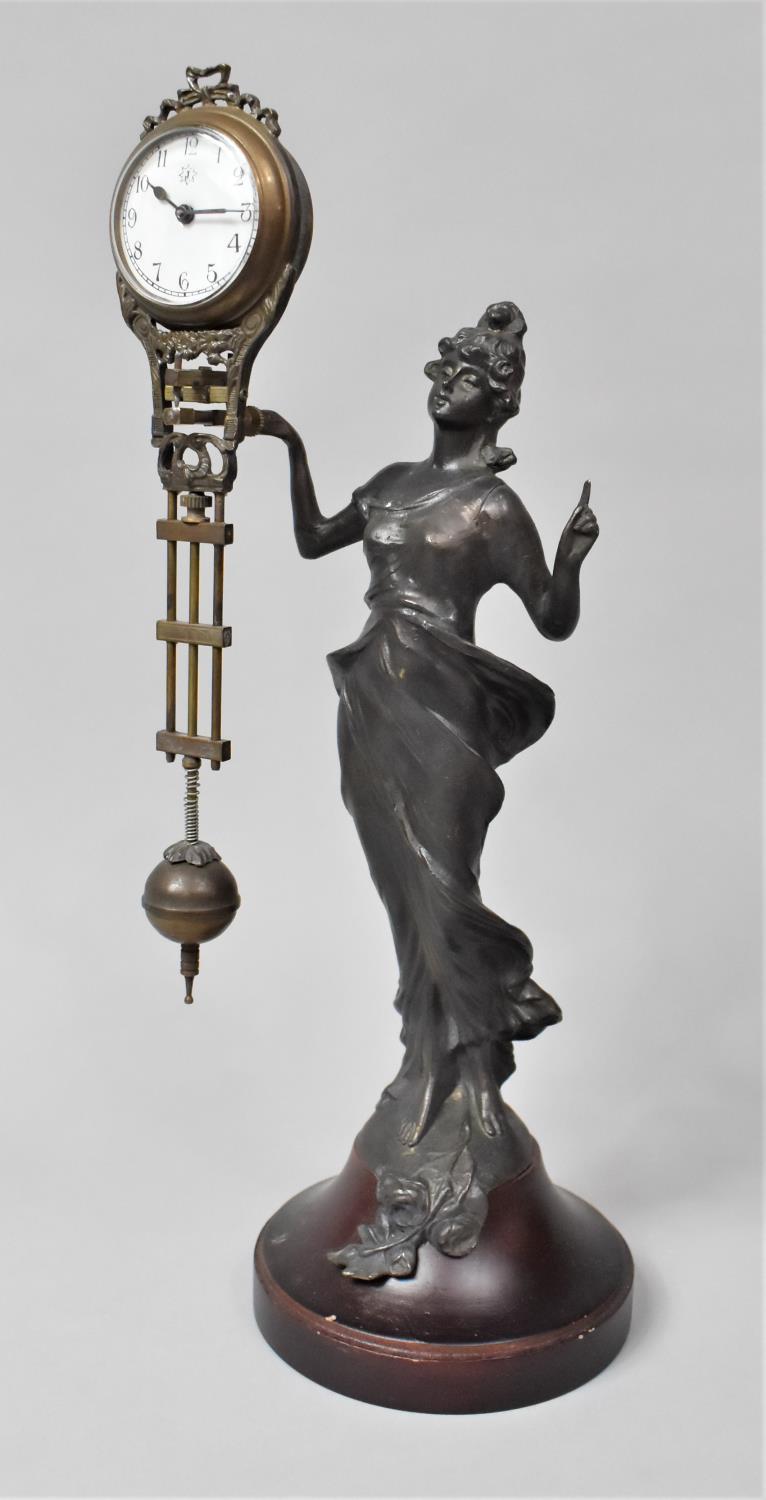 A Reproduction Bronze Spelter Mystery Clock in the Form of an At Nouveau Maiden with Finger Pointing - Bild 3 aus 3
