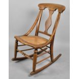 A Late Victorian/Edwardian Cane Seated Rocking Chair
