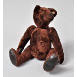 A Reproduction Teddy Bear in the Manner of Steiff, 23cm high