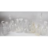 A Collection of 14 Various Glass Decanters