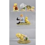 A Collection of Five Royal Doulton Winnie the Pooh Collection Figures