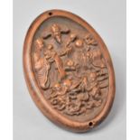 A Chinese Carved Oval Decorated in Carved Relief with Chinese Gods, 7cm High
