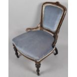 A Victorian Aesthetic Ladies Nursing Chair with Ebonised and Walnut Frame