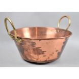A Circular Copper Pan with Two Brass Carrying Handles, 35cm Diameter