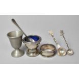 A Silver Plated Salt, Silver Plated Napkin Ring, Egg Cup and White Metal Condiment and Coin Spoons