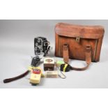 A Vintage Leather Case Containing Clockwork, Bolex Paillard Clockwork 8mm Cine Camera, Light