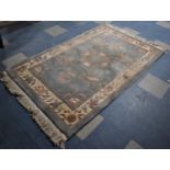 A Chinese Woollen Rug, 200x119cm