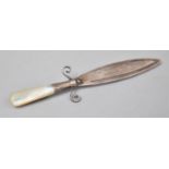 A Silver and Mother of Pearl Bookmark in the Form of a Short Sword by C&N, 11cm Long