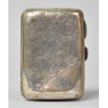 A Silver Cigarette Case Monogrammed HA and with Foliate Decoration