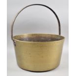 A Vintage Brass Jam Kettle with Iron Loop Handle, 33cm Diameter