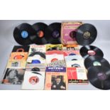 A Collection of 45rpm Records to Include Peggy Lee, Stan Kenton, Sarah Vaughn, Nat King Cole, Rod