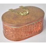 A Copper Oval Box with Brass Hinges and Handle, 11.5cm Long