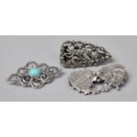 Two Silver Brooches and a Silver Clip