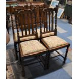 A Set of Four Edwardian Barley Twist Oak Dining Chairs with Tapestry Seats