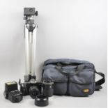 A Minolta Dynax 300 FI 35mm Camera Together with Flash Gun, Zoom Lens, Canvas Bag and Flik 35SN