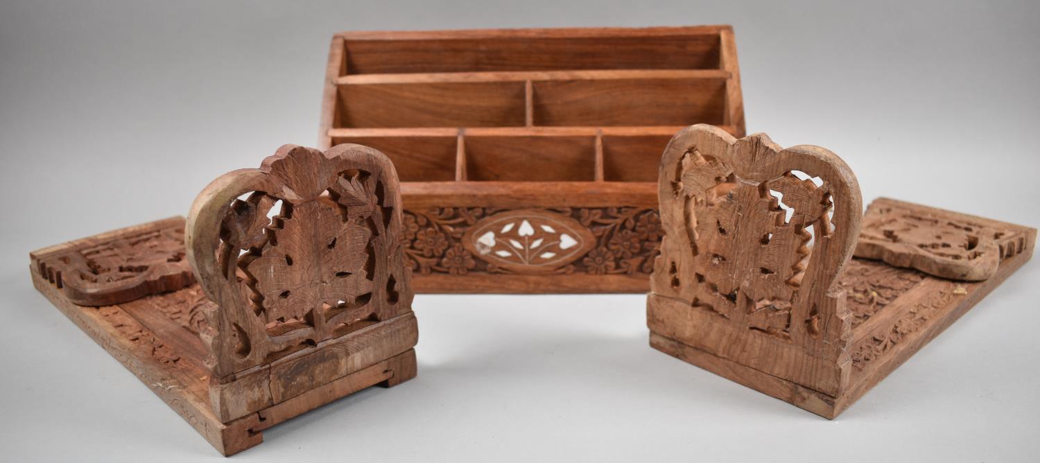 A Far Eastern Teak Stationery Rack and Two Carved Book Slides, 31cm Wide - Image 2 of 2