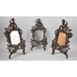 A Set of Three Easel Backed Art Nouveau French Bronzed Photo Frames, the Finials with Reclining