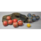 A Collection of Various Vintage Wooden Blue and Red Croquet Balls