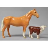 A Beswick Hereford Calf and a Palomino Pony