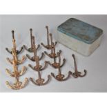 A Collection of Various Metal Coat Hooks
