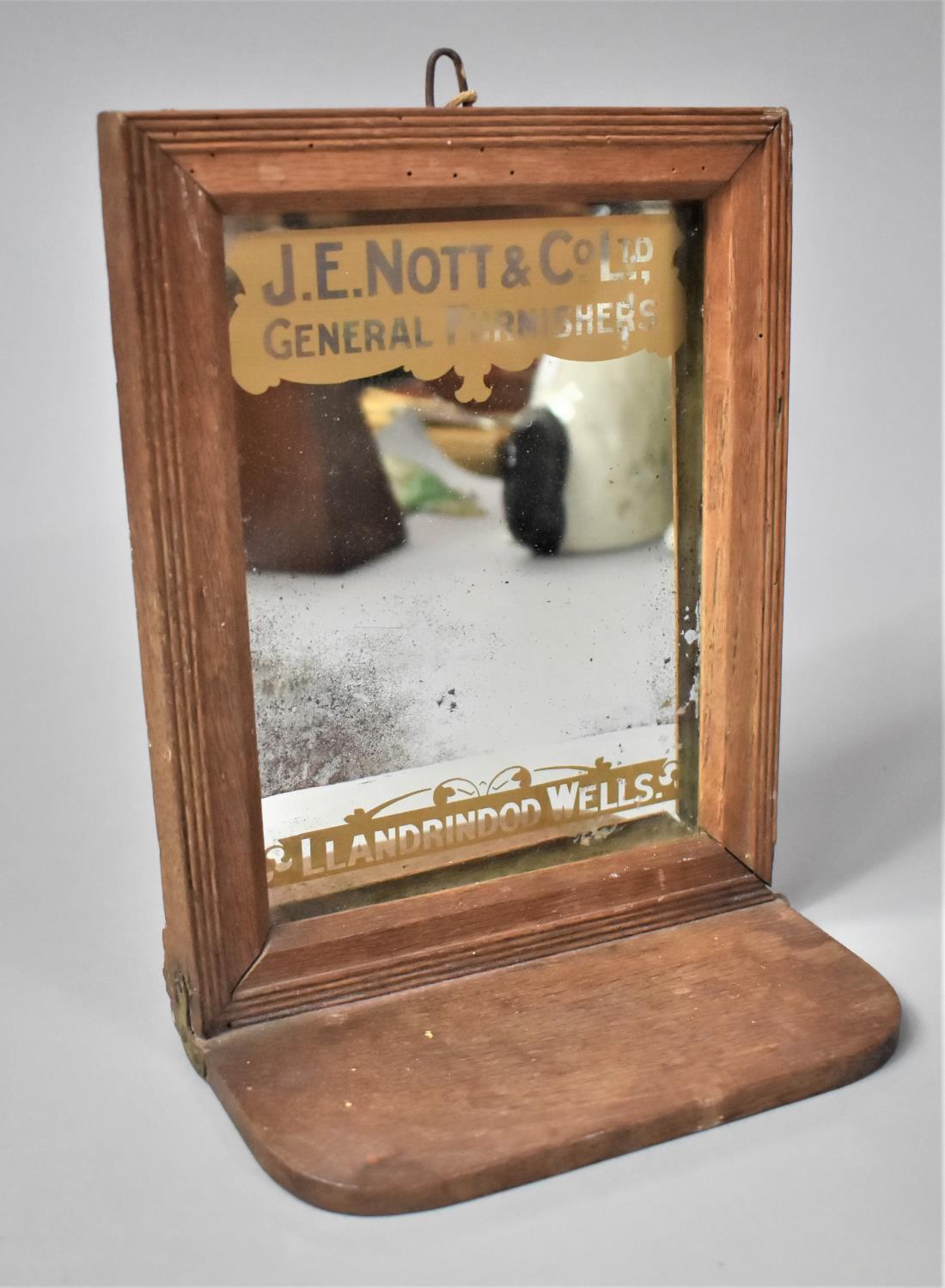 A Late Victorian/Edwardian Wall Hanging Advertising Mirror For J E Nott and Co Ltd General