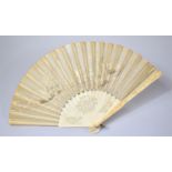 A Japanese 19th Century Carved Ivory Fan Having Embroidered Silk Panels Depicting Fishermen by Lake