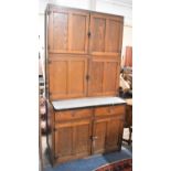 An Edwardian Wooden Housekeepers Cupboard with Two Drawers Over Cupboard Base, Raised Shelved Top