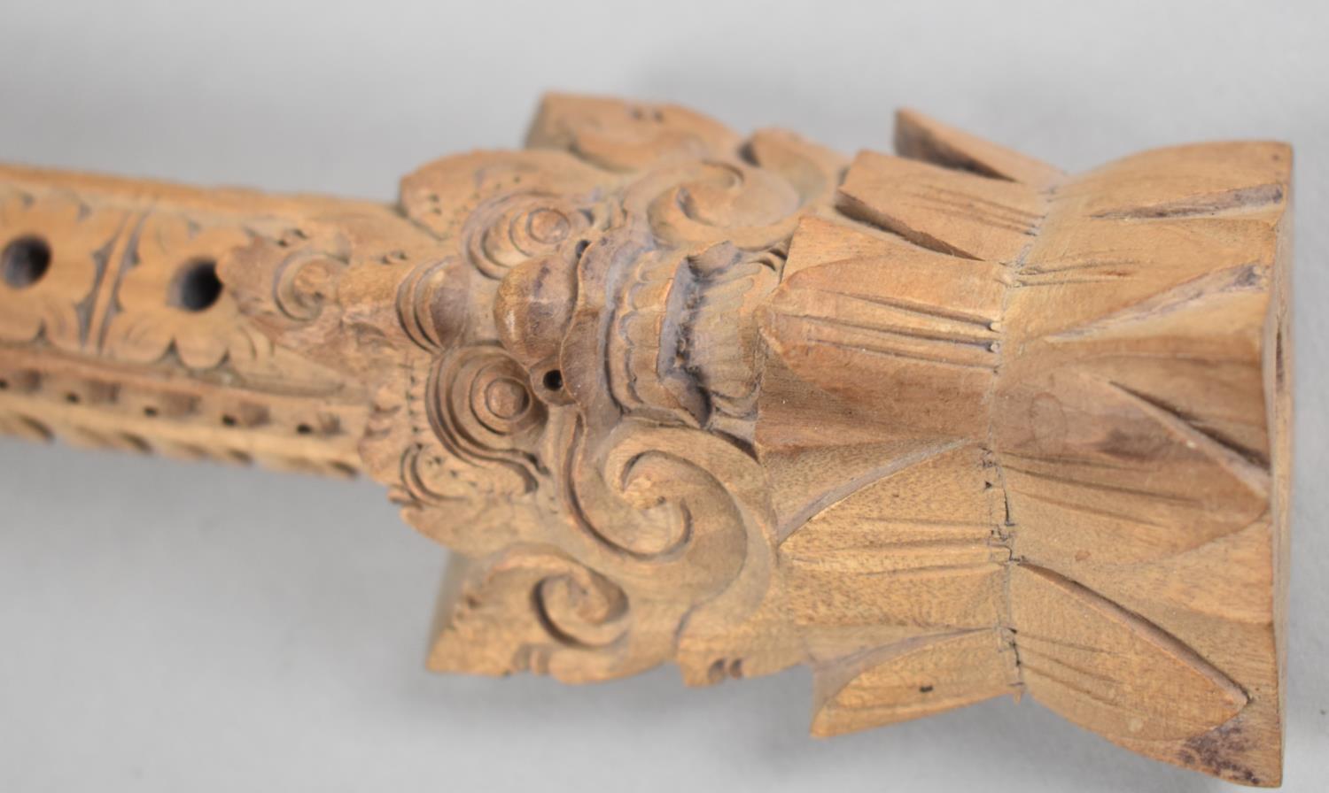 A Far Eastern Carved Wooden Musical Instrument, 33.5cms High - Image 2 of 2