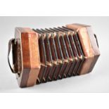 A Vintage Hexagonal Accordion with Ten Buttons, Some Requiring Attention