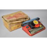 A Vintage Mettype Junior Toy Tinplate Typewriter with Original Cardboard Box (Box Has Been Water