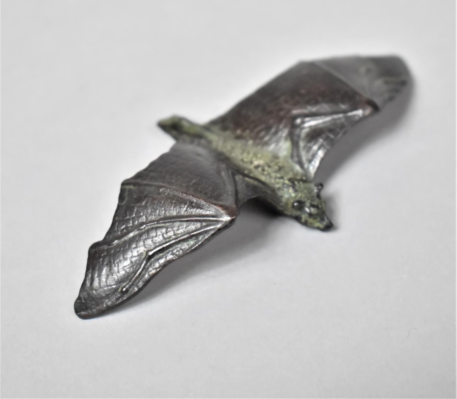 A Bronze Stud of a Bat in Flight, 10cm Wide