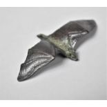 A Bronze Stud of a Bat in Flight, 10cm Wide