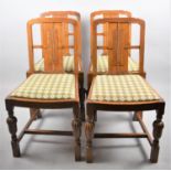 A Set of Four Oak Art Deco Dining Chairs